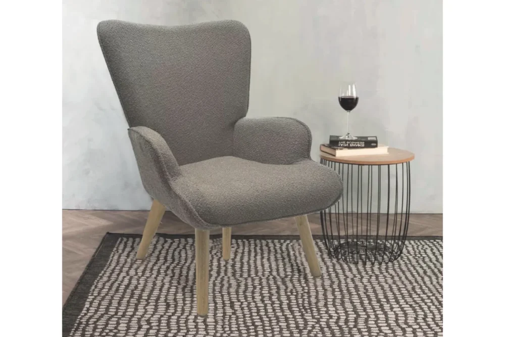 Poltrona in tessuto Colette